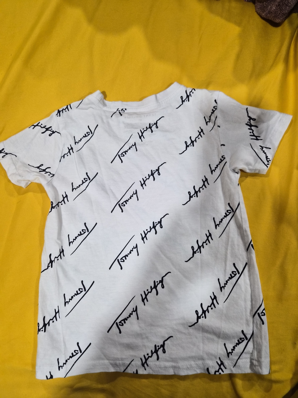 #6 Tommy Hilfiger White Tee with Black Script All-Over Logo